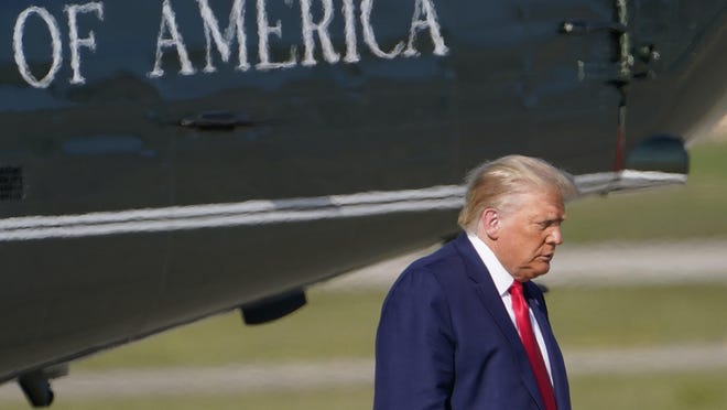 President Donald Trump walks from Marine One towards Air Force One at Andrews Air Force Base, Md., Monday, Sept. 21, 2020. Trump is heading to Ohio for stops near Dayton and Toledo.